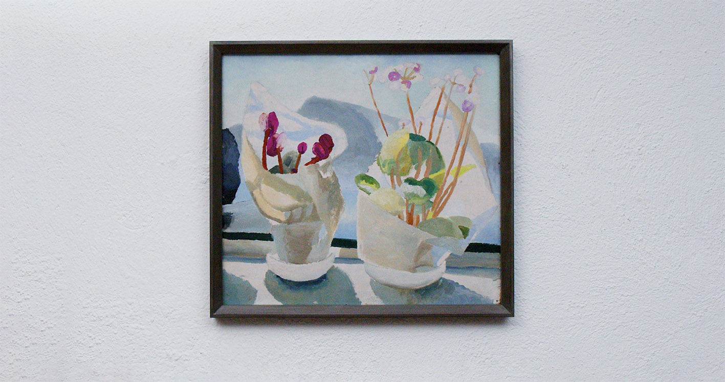 A close-up of a framed painting of two potted plants by Winifred Nicholson, cyclamen and primula, sitting on a windowsill. The artwork uses soft, pastel tones with visible brushstrokes.