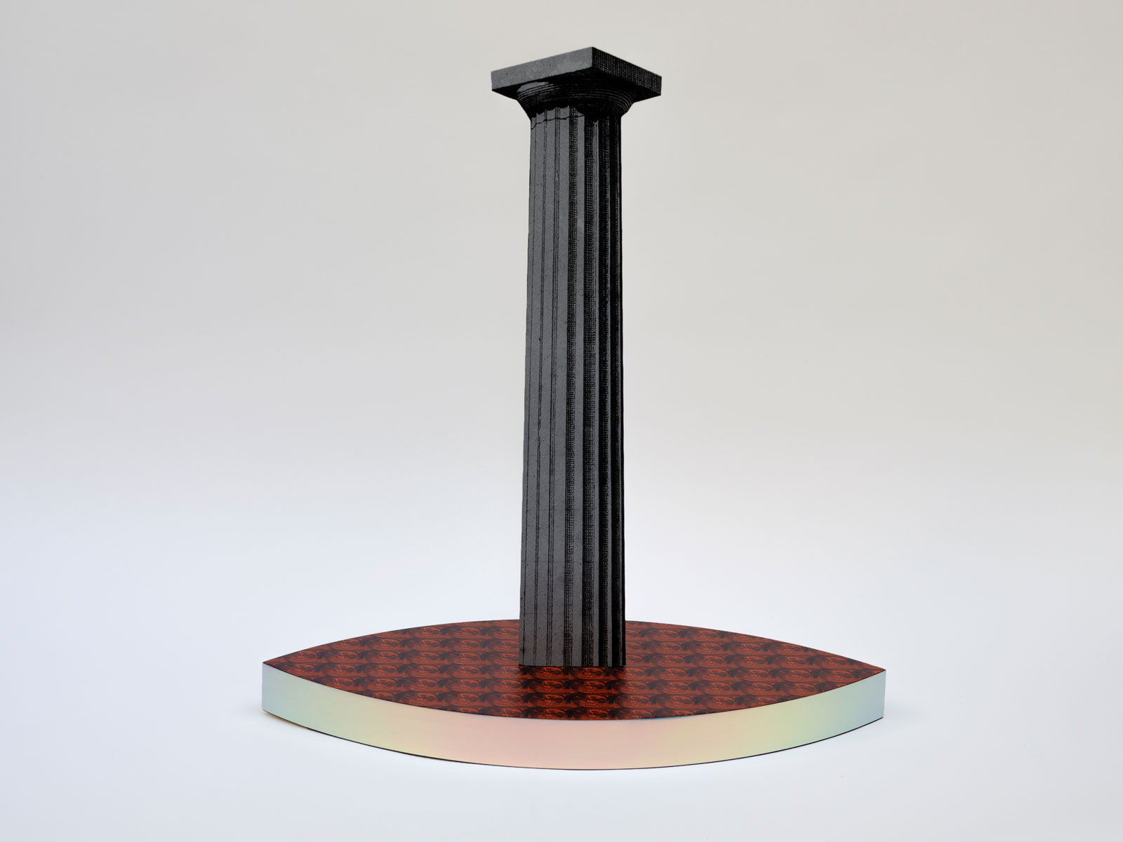 An eye-shaped base with a repeating image and an iridescent strip features a protruding historic column rising from the centre