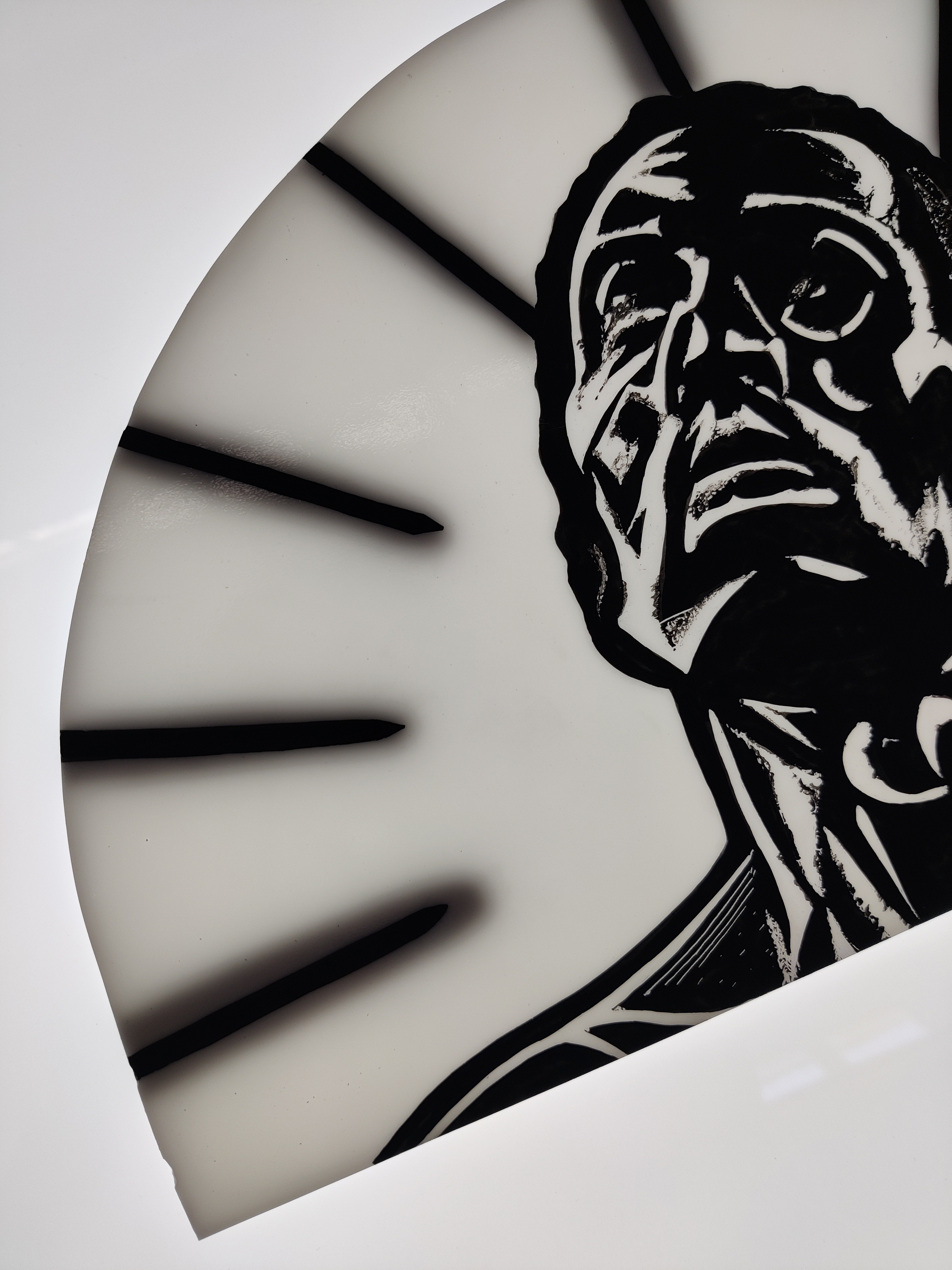 A small sample piece of Christopher Samuel’s stained glass produced at Studio Orme by Claire Orme. The image on the glass is black and white and shows the head of a black man looking up with a halo of light around him.
